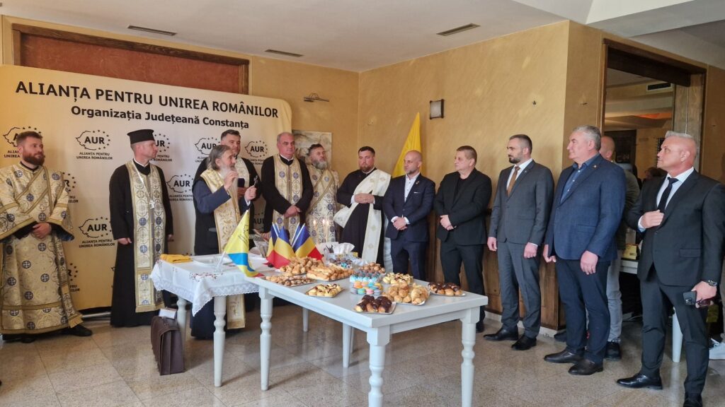 FOTO UPDATE Teodosie, inculpat într-un dosar DNA, a decis să sfințească sediul AUR Constanța cu o săptămână înainte de alegeri 2 FOTO UPDATE Teodosie, inculpat într-un dosar DNA, a decis să sfințească sediul AUR Constanța cu o săptămână înainte de alegeri WhatsApp Image 2025 05 11 at 13.59.33