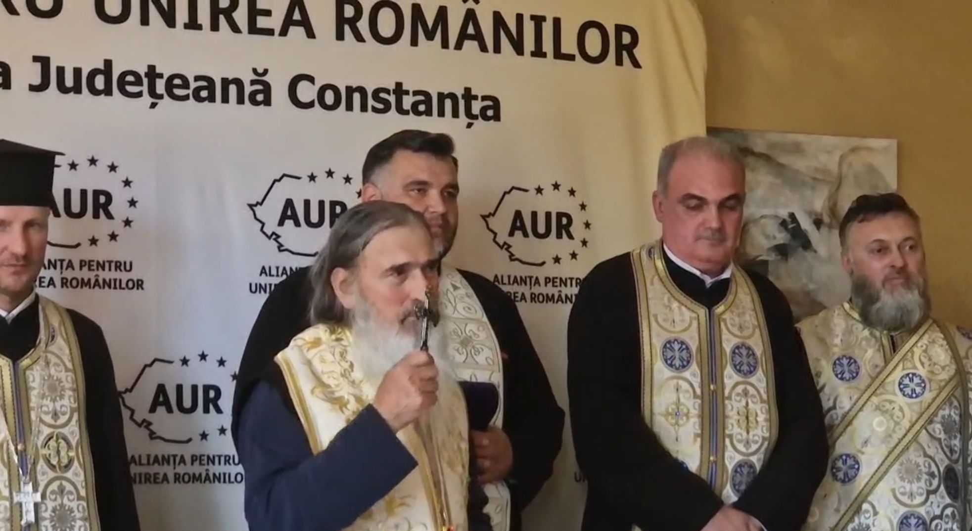 FOTO UPDATE Teodosie, inculpat într-un dosar DNA, a decis să sfințească sediul AUR Constanța cu o săptămână înainte de alegeri WhatsApp Image 2025 05 11 at 14.00.40